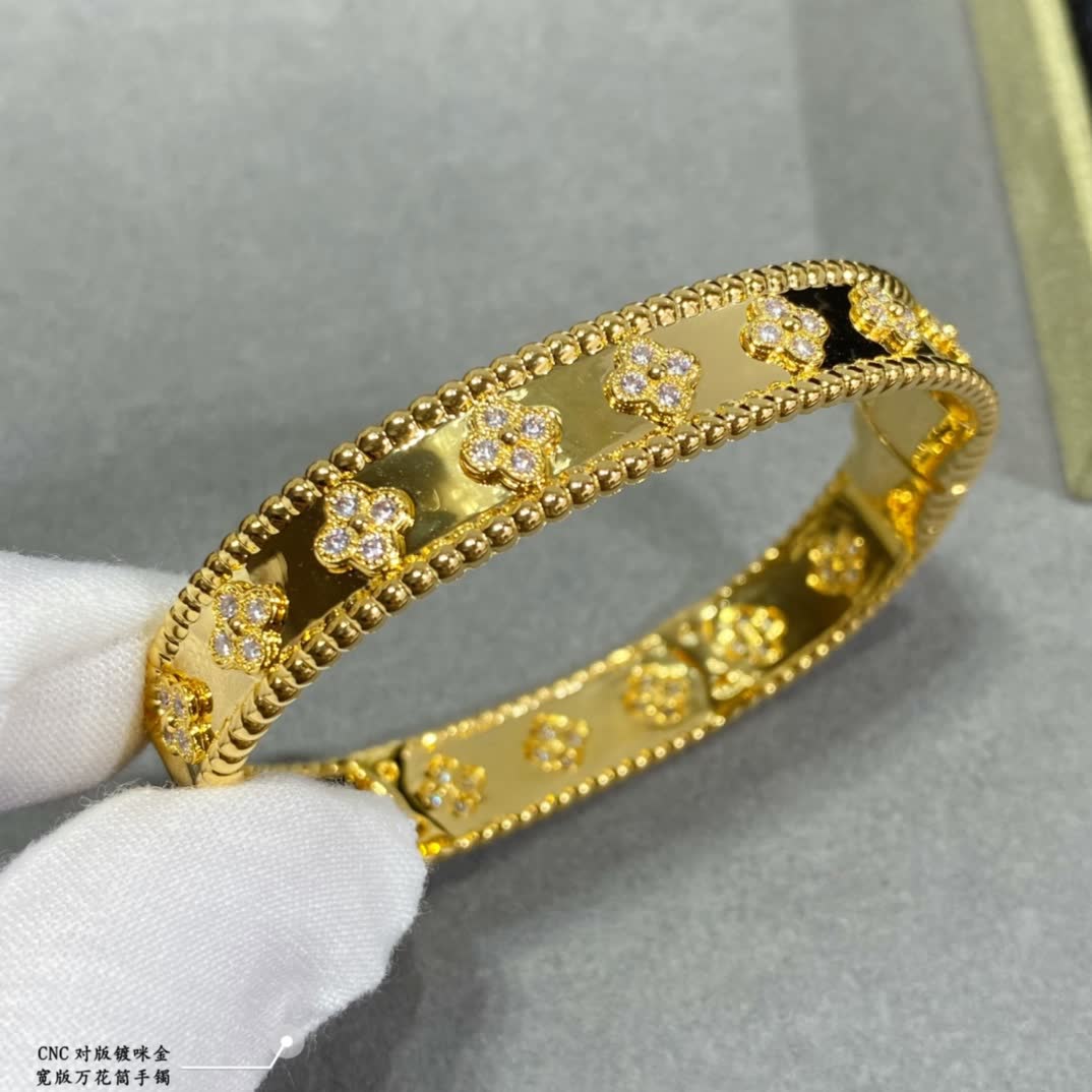 Van Cleef & Arpels Gold and Silver Flower Pattern Bracelets